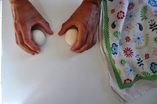 Shaping balls of dough for Devonshire splits. Or Cornish splits