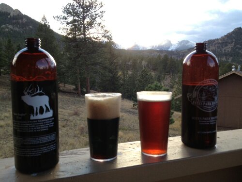 Baby Bugler 2 pint bottles of Estes Park Porter (left) and Redrum Ale (right), with Rockies sunset Baby Bugler 2 pint bottles of Estes Park Porter (left) and Redrum Ale (right), with Rockies sunset