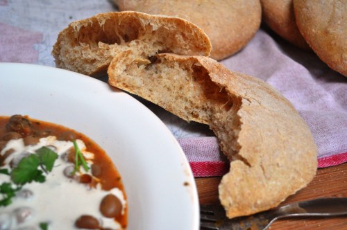 Khobz, torn open, with ful medames