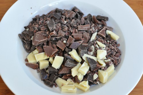 Three types of chocolate chunks and cocoa nibs