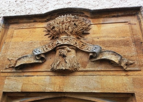 An old "wheatsheaf" pub sign in Dorset An old "wheatsheaf" pub sign in Dorset